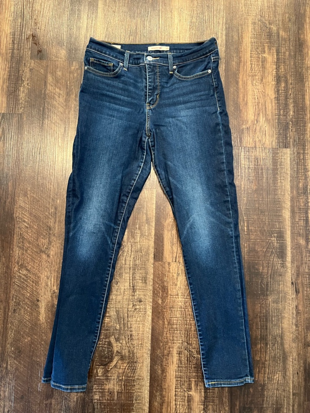 Levi's 311 Shaping Skinny Jeans in Dark Blue with Gold Stitching